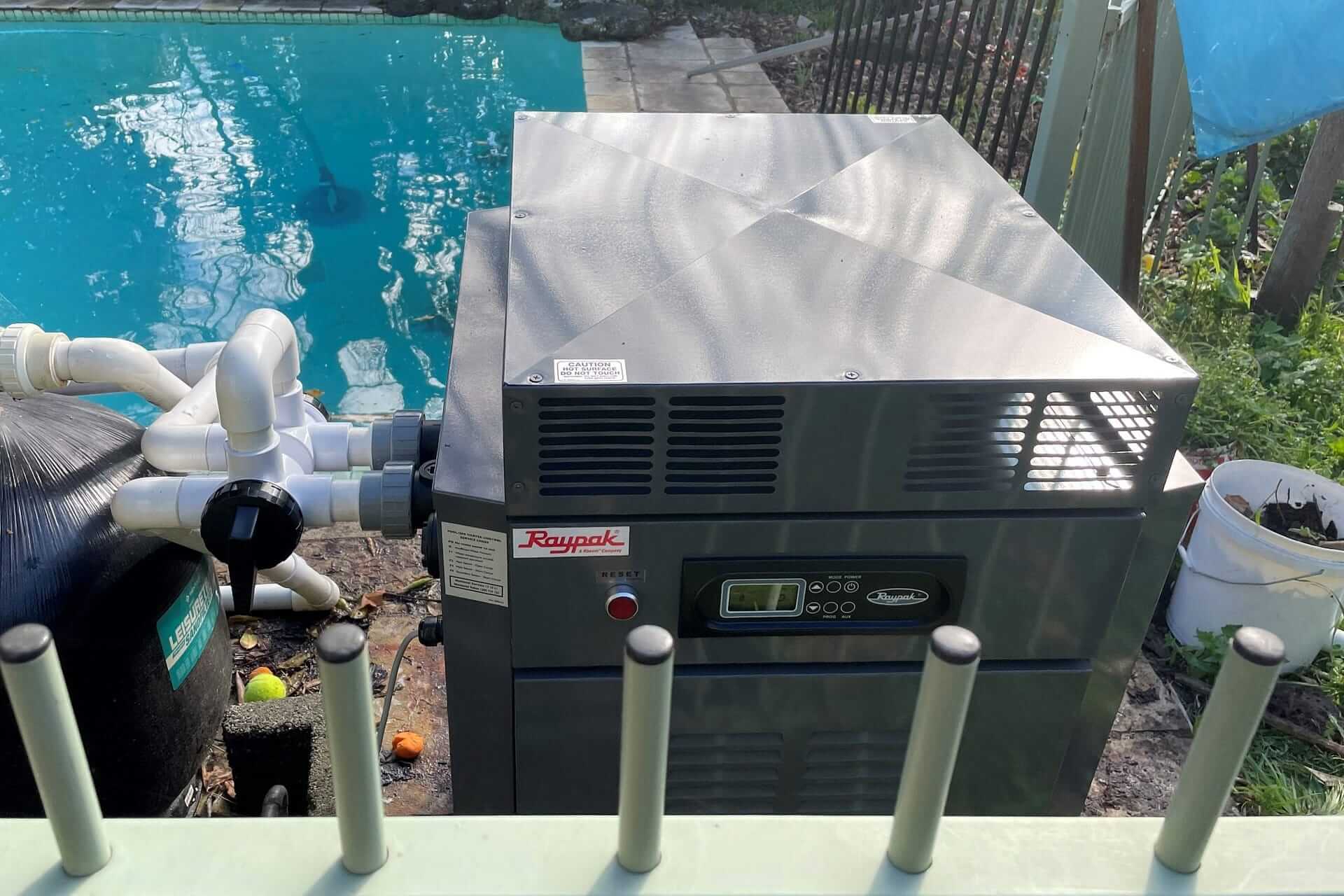 Raypak Water Heater beside pool