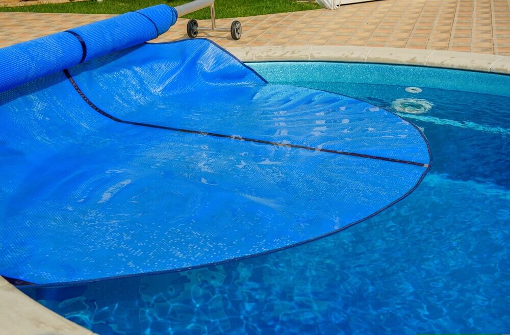 A blue automatic pool cover in Brisbane